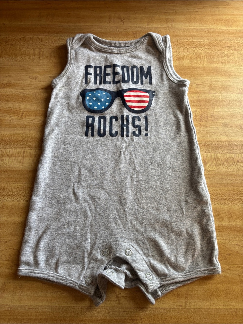Gray Baby Romper with 'Freedom Rocks' Sunglasses Graphic